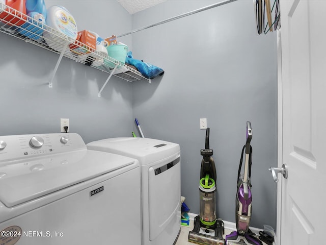 laundry area with washer and dryer