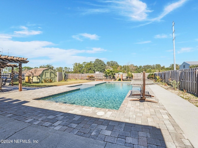 view of pool with a pergola and a patio area