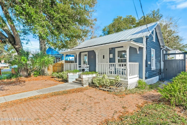 bungalow-style home with a porch