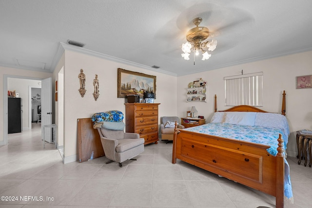 bedroom featuring a textured ceiling, ceiling fan, ornamental molding, and light tile patterned flooring