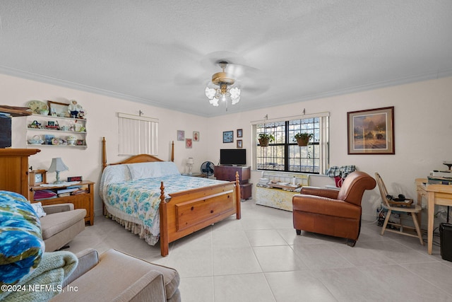 bedroom with ceiling fan and crown molding