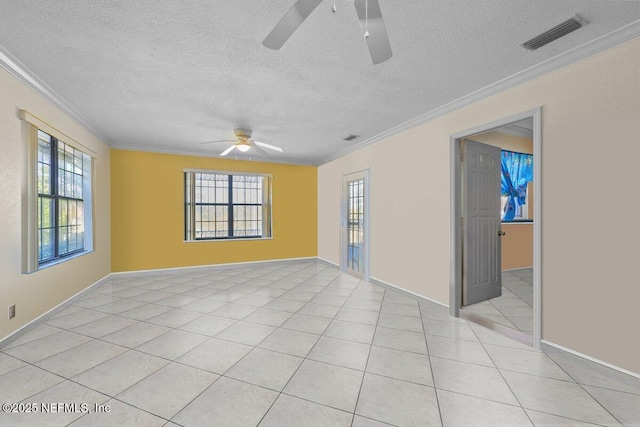 130 Jack Oak Dr, Melrose, FL 32666 - unfurnished room featuring a ceiling fan, visible vents, a healthy amount of sunlight, and crown molding