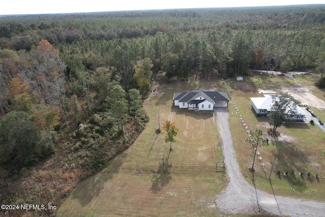 birds eye view of property featuring a rural view