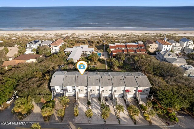 aerial view with a beach view and a water view