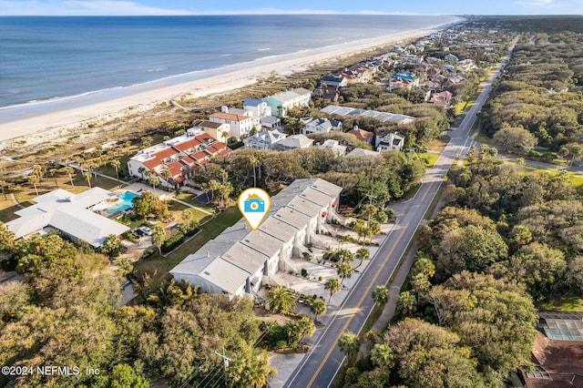 aerial view featuring a water view and a beach view