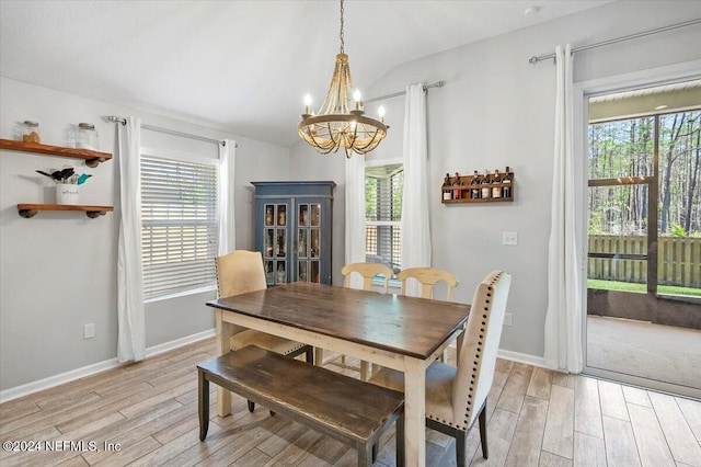 dining area with plenty of natural light and light wood-type flooring