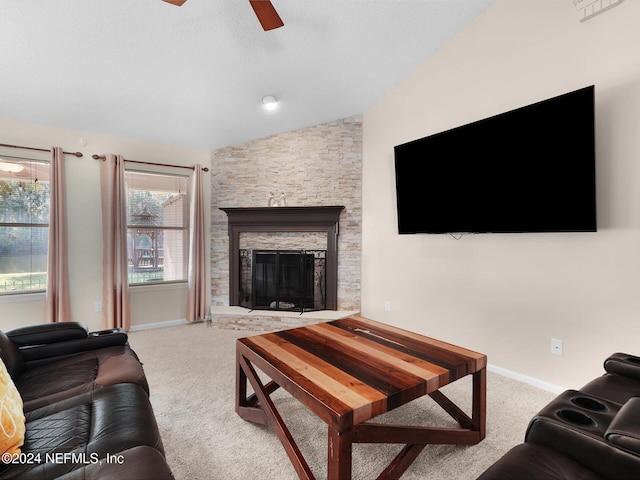 carpeted living room featuring a fireplace, a textured ceiling, vaulted ceiling, and ceiling fan