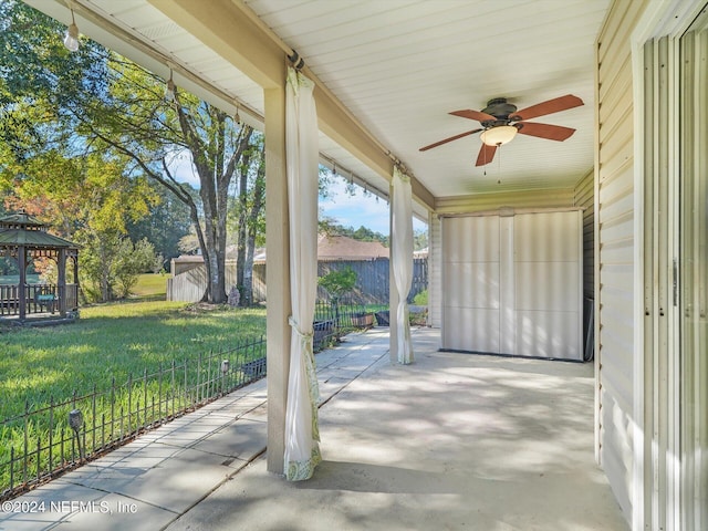 view of patio featuring a gazebo and ceiling fan