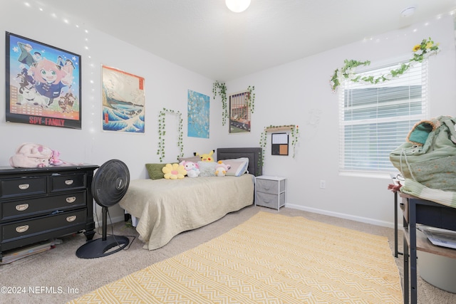 714 Meadow Ridge Dr, Saint Augustine, FL 32092 - bedroom featuring light carpet and baseboards