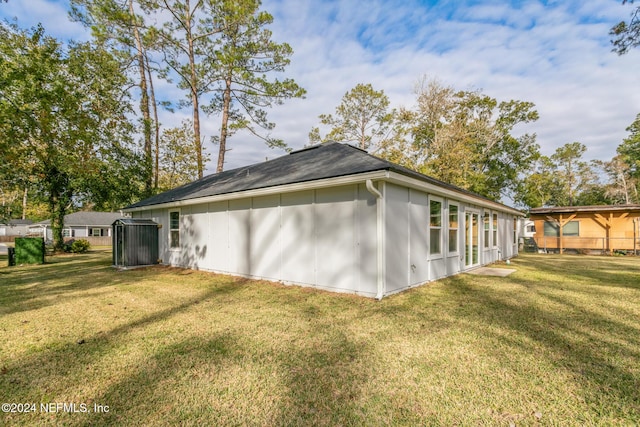 view of property exterior featuring a yard