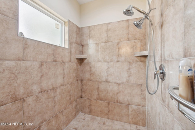 details featuring a tile shower