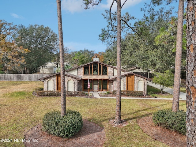 view of front of house with a front lawn