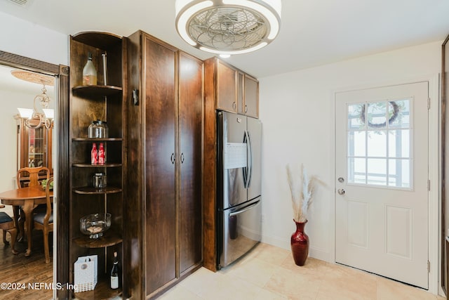 kitchen featuring stainless steel fridge