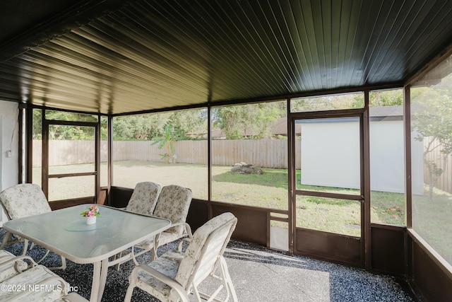 sunroom / solarium featuring plenty of natural light