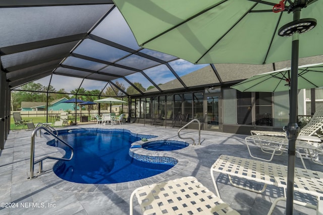 5321 Muskogean St, Saint Augustine, FL 32092 - view of swimming pool featuring a pool with connected hot tub, a patio area, and a lanai