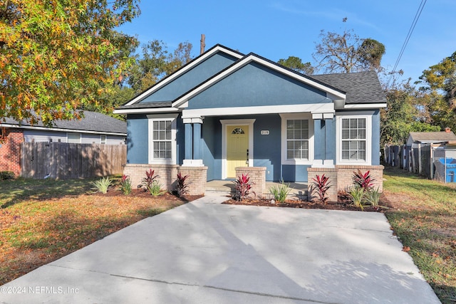 view of front of home featuring covered porch