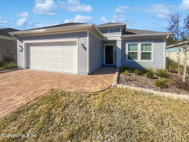 view of front of home featuring a garage