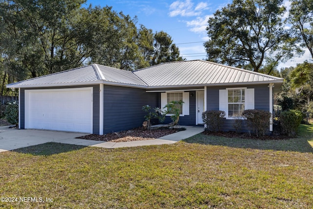 single story home with a front yard and a garage