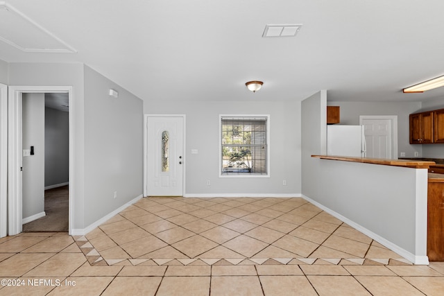 view of tiled foyer