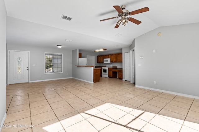 unfurnished living room with light tile patterned floors, ceiling fan, and lofted ceiling