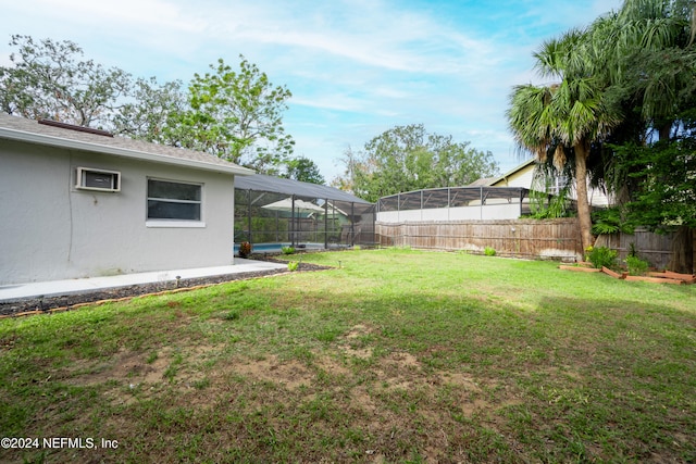 view of yard with a lanai