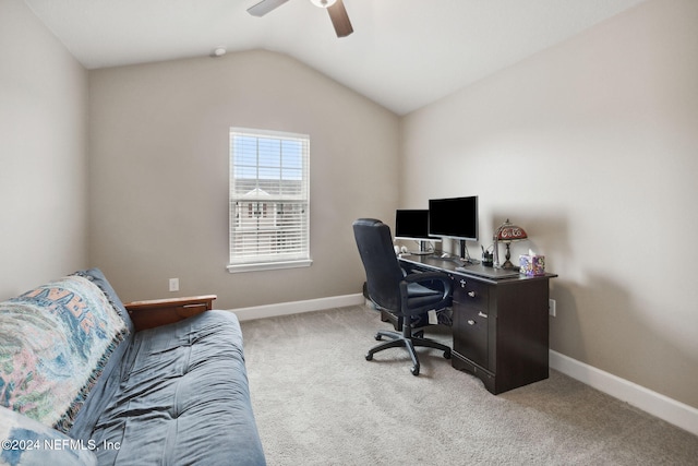 home office featuring ceiling fan, lofted ceiling, and light carpet