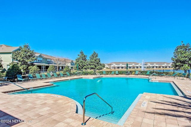 view of pool with a patio area