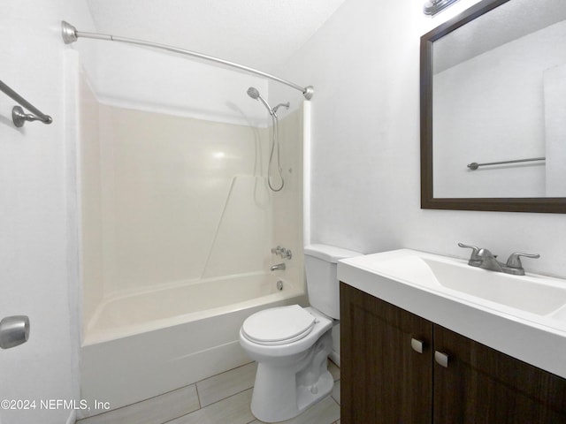 full bathroom featuring tile patterned flooring, vanity, toilet, and tub / shower combination