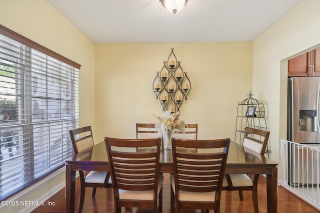 dining room with dark wood-type flooring