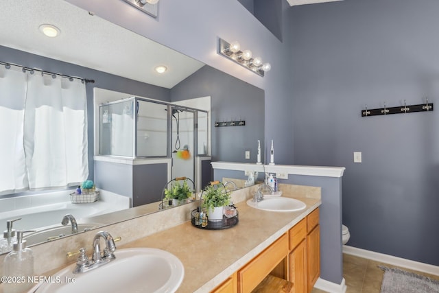 bathroom with vanity, lofted ceiling, tile patterned floors, toilet, and walk in shower