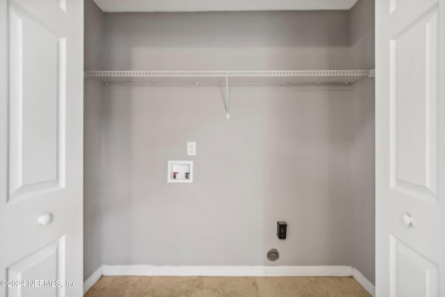 laundry room with washer hookup and electric dryer hookup