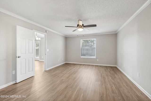 unfurnished room with a textured ceiling, light hardwood / wood-style flooring, ceiling fan with notable chandelier, and ornamental molding