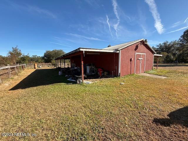 exterior space with a lawn