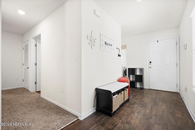 hallway featuring dark hardwood / wood-style flooring