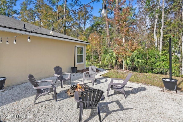 view of patio featuring an outdoor fire pit