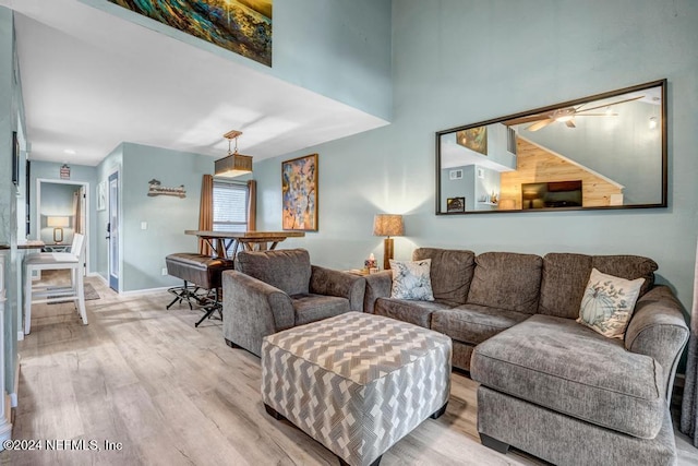 living room with light hardwood / wood-style floors