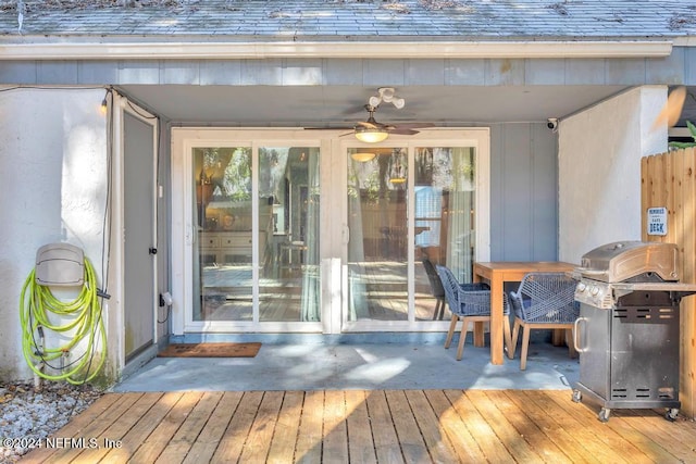 exterior space with ceiling fan and area for grilling