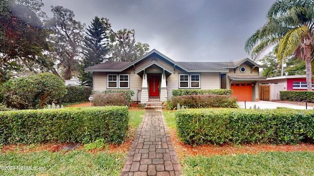 view of front of home with a garage