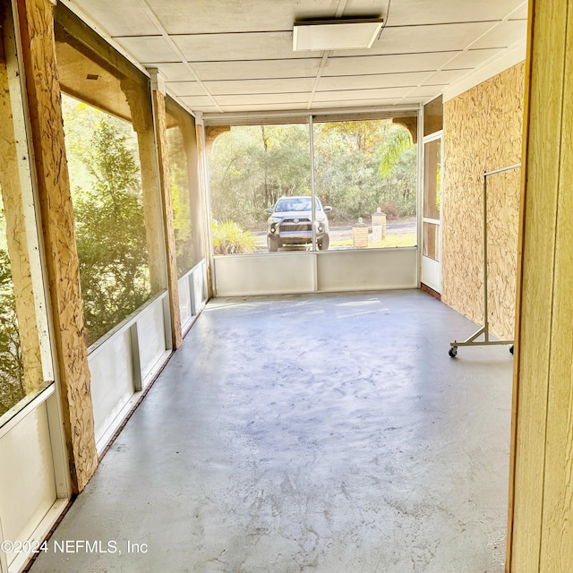 unfurnished sunroom with a healthy amount of sunlight