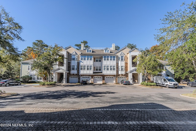 8550 Touchton Rd Unit 1226, Jacksonville, FL 32216 - view of property with a garage