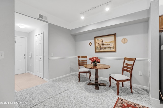 8550 Touchton Rd Unit 1226, Jacksonville, FL 32216 - sitting room featuring rail lighting and light tile patterned floors