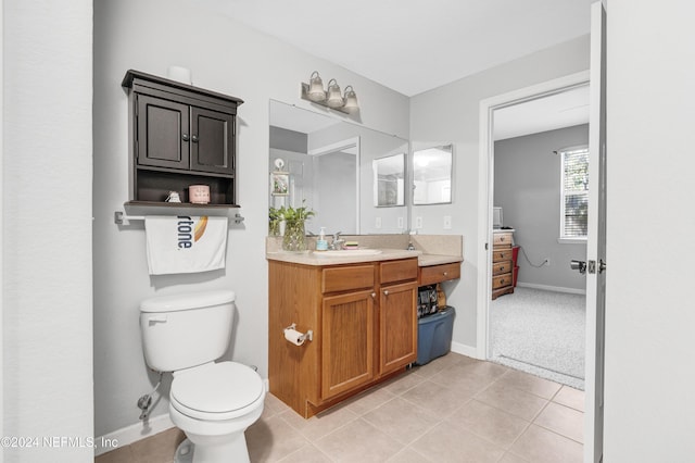 8550 Touchton Rd Unit 1226, Jacksonville, FL 32216 - bathroom with tile patterned flooring, vanity, and toilet