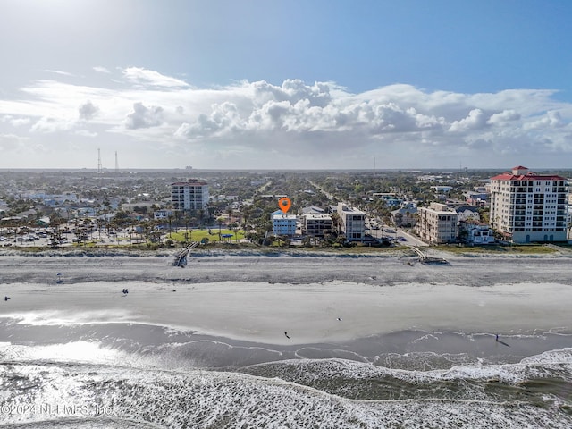 drone / aerial view with a view of the beach and a water view