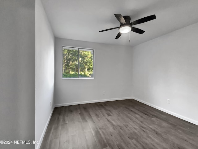 8849 Old Kings Rd S Unit 181, Jacksonville, FL 32257 - spare room featuring dark wood-style floors and ceiling fan