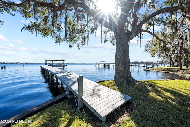 view of dock with a water view