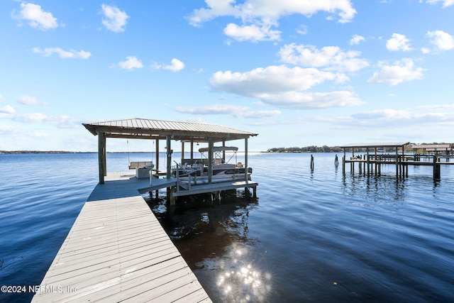 view of dock with a water view