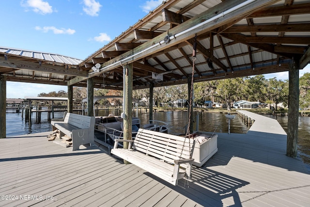 dock area featuring a water view