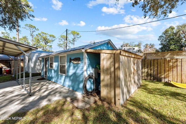 view of outdoor structure with a yard