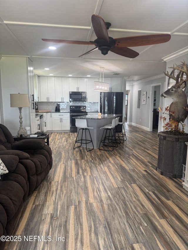 130 Cedar Creek Rd, Palatka, FL 32177 - living room with dark wood-style floors, ceiling fan, and recessed lighting
