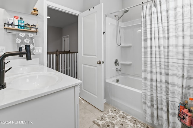 bathroom with tile patterned floors, shower / bath combo, and vanity